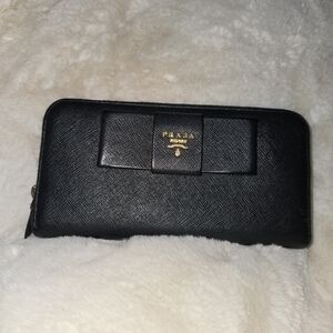 Prada  Black Saffiano Leather Bow Zip around wallet